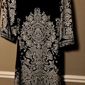 Papillon size small beautiful loose fitting dress. Characters